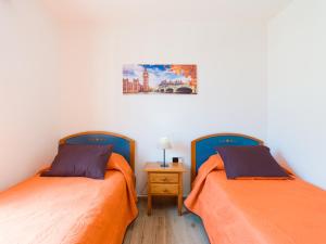 Postel nebo postele na pokoji v ubytování Vv Casa Maruca Accesibilidad - Playa 5 min
