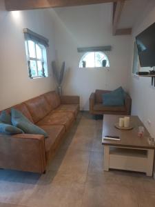 Posezení v ubytování B&B De Kaagse Boer