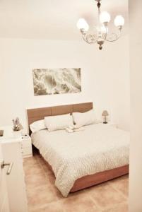 Postel nebo postele na pokoji v ubytování Apartamento maripipi