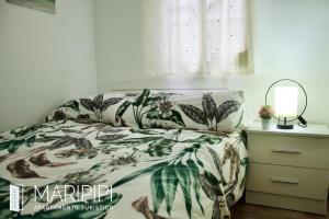 Postel nebo postele na pokoji v ubytování Apartamento maripipi