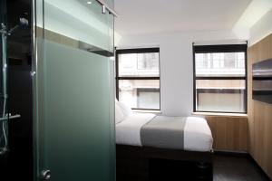Voodi või voodid majutusasutuse The Z Hotel Piccadilly toas