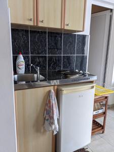 Кухня или мини-кухня в Apartments Kuljaca
