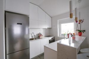 Η κουζίνα ή μικρή κουζίνα στο Afrodita apartman