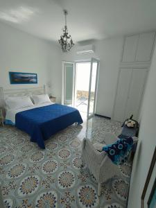 A bed or beds in a room at Positanobay