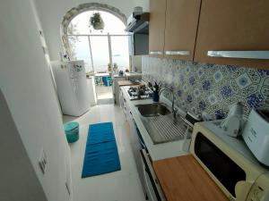 A kitchen or kitchenette at Positanobay