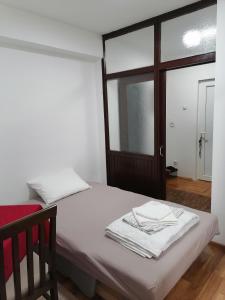 Postel nebo postele na pokoji v ubytování Apartman Radulović