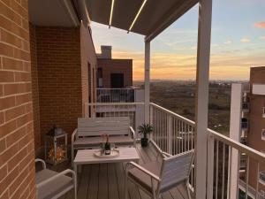 A balcony or terrace at AGM Suite Rome Airport FCO - Attico Parco Leonardo
