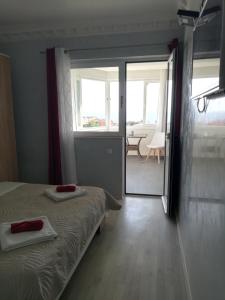 Postel nebo postele na pokoji v ubytování apartmani Zoran Bilić