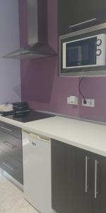 Kuchyň nebo kuchyňský kout v ubytování Apartamento Bienvenida + 2 fotografie