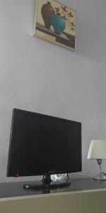 TV a/nebo společenská místnost v ubytování Apartamento Bienvenida