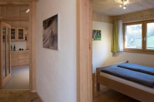 Ένα ή περισσότερα κρεβάτια σε δωμάτιο στο Ferienhaus Schwarzenbach