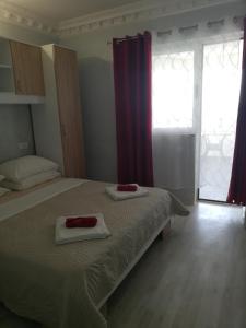 Postel nebo postele na pokoji v ubytování apartmani Zoran Bilić