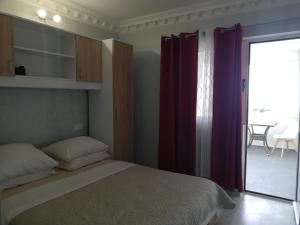 Postel nebo postele na pokoji v ubytování apartmani Zoran Bilić