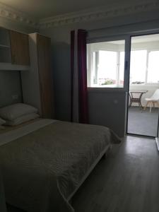 Postel nebo postele na pokoji v ubytování apartmani Zoran Bilić