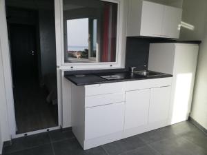 Kuchyň nebo kuchyňský kout v ubytování apartmani Zoran Bilić + 32 fotografií