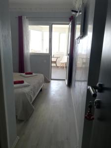 Postel nebo postele na pokoji v ubytování apartmani Zoran Bilić