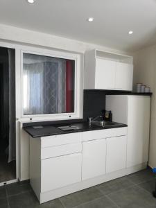Kuchyň nebo kuchyňský kout v ubytování apartmani Zoran Bilić
