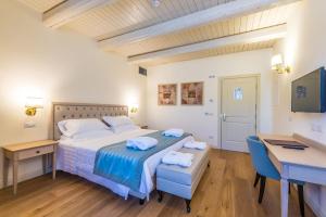 Postel nebo postele na pokoji v ubytování Relais Paradiso Resort & Spa