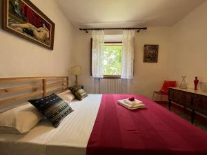 A bed or beds in a room at Casina Orione
