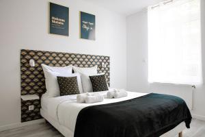 Postel nebo postele na pokoji v ubytování #Sinetta# Agréable et Spacieux
