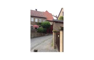 an empty street in a town with houses at 3 Bedroom Nice Home In Zeil Am Main in Zeil