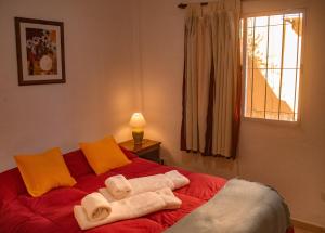 Posteľ alebo postele v izbe v ubytovaní Cabañas Valles Calchaquíes