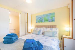 Voodi või voodid majutusasutuse Bluebell Cottage toas