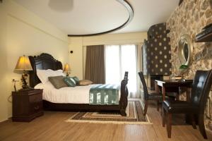 Posteľ alebo postele v izbe v ubytovaní Archontopetra Boutique Hotel