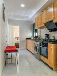 VELASQUEZ Appartements Fast Wifi and Ocean View tesisinde mutfak veya mini mutfak