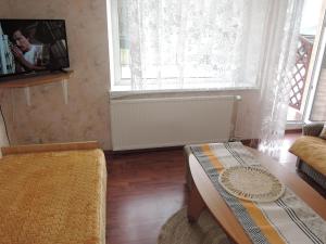 A television and/or entertainment center at Holiday home in Miedzyzdroje for 19 persons