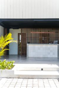 a pivot table in front of a building at TRIBAL Coworking Bali in Canggu