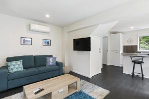 a living room with a couch and a table at Liokai in Anglesea