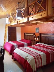 Postel nebo postele na pokoji v ubytování Hotel Ecológico Temazcal