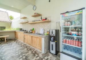 Kuchyň nebo kuchyňský kout v ubytování Amazon Guesthouse by Bukit Vista