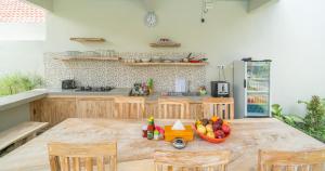 Kuchyň nebo kuchyňský kout v ubytování Amazon Guesthouse by Bukit Vista