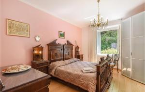 Posteľ alebo postele v izbe v ubytovaní 3 Bedroom Amazing Apartment In Genova