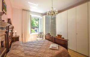 Posteľ alebo postele v izbe v ubytovaní 3 Bedroom Amazing Apartment In Genova