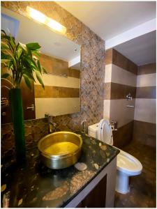 Koupelna v ubytování Satkar Boutique Home