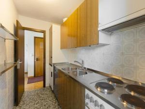 Η κουζίνα ή μικρή κουζίνα στο Apartment Crans-Montana near Ski Slopes