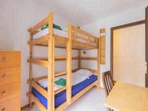 Ένα ή περισσότερα κρεβάτια σε δωμάτιο στο Apartment Crans-Montana near Ski Slopes +60 φωτογραφίες