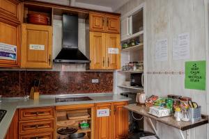Kuchyň nebo kuchyňský kout v ubytování Hostel Triana Backpackers