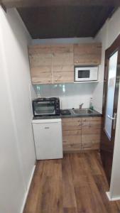Kuchyňa alebo kuchynka v ubytovaní Mátrai Vándor Apartmanok