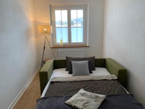 מיטה או מיטות בחדר ב-Ferienwohnungen Bohner/Wohnung Elisabeth