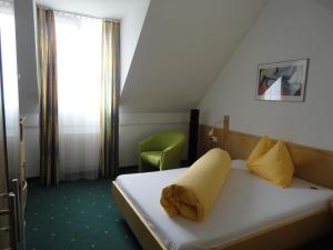 Postelja oz. postelje v sobi nastanitve Hotel Hofbalzers
