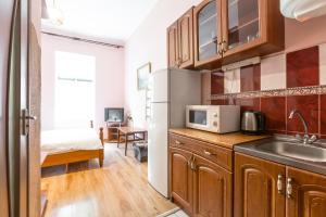 Η κουζίνα ή μικρή κουζίνα στο Квартира на вулиці Федорова 29 біля Площі Ринок Підвальна