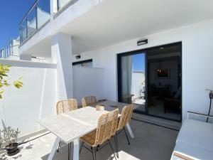 Balkón alebo terasa v ubytovaní Terrazas de Ladera Duplex 5 Casasol