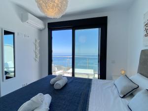 Posteľ alebo postele v izbe v ubytovaní Terrazas de Ladera Duplex 5 Casasol
