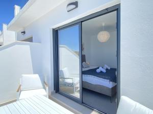 Posteľ alebo postele v izbe v ubytovaní Terrazas de Ladera Duplex 5 Casasol