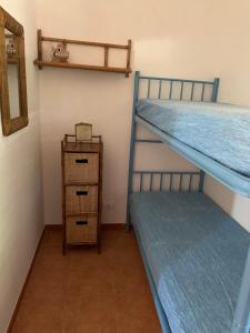 Poschodová posteľ alebo postele v izbe v ubytovaní Casa vacanza su Pantelleria