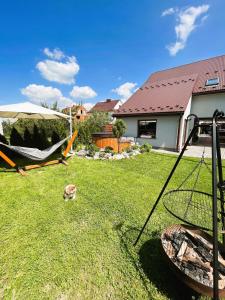 Vonkajšia záhrada v ubytovaní Apartament Dwupoziomowy Nad Tamami